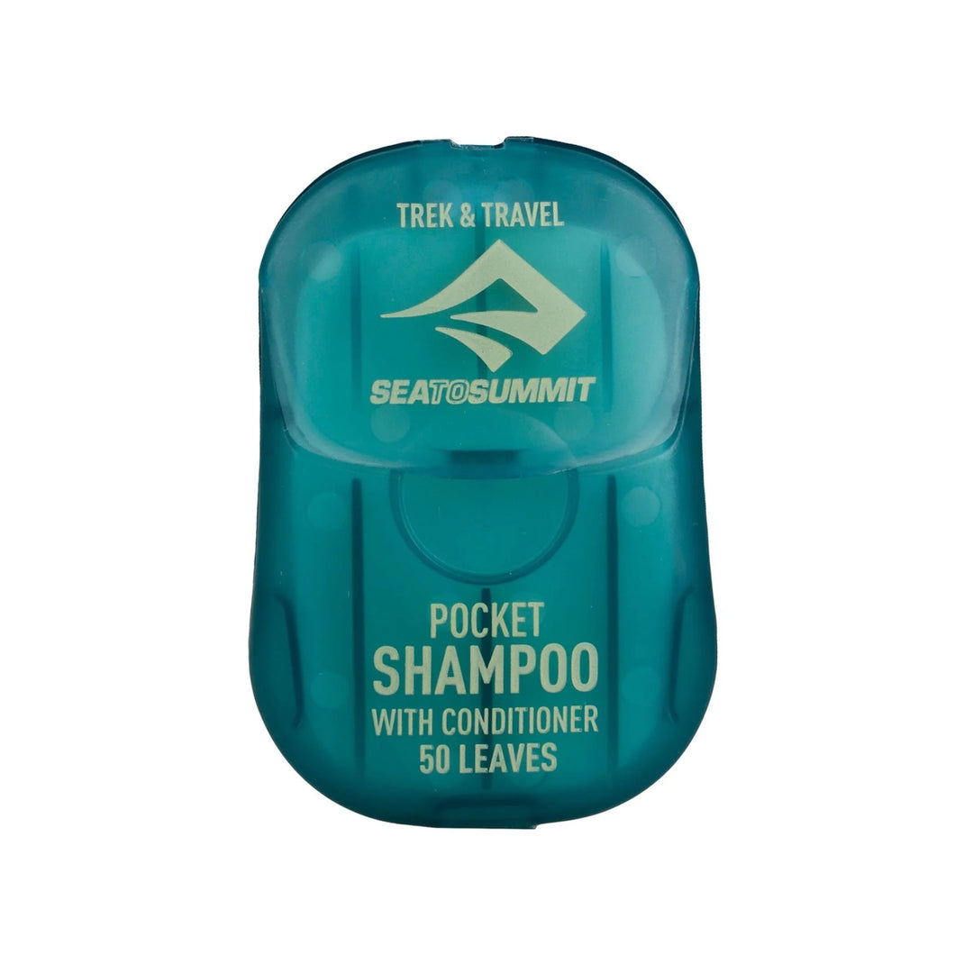 A teal blue container labeled 'Sea to Summit Pocket Shampoo with Conditioner 50 Leaves' for dry travel soap leaves.